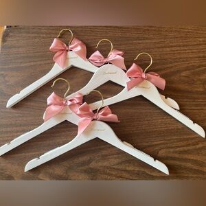 Set of 5 White and Gold Wooden Bridesmaid Hangers with Pink Bow